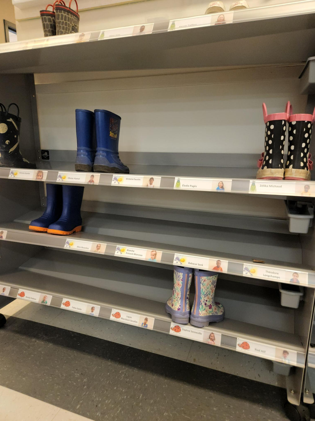 Rakabot metal boot racks with name plates in a daycare