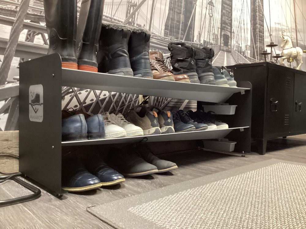 Tall boots on the top shelf of a Titan, with shoes on the lower shelf